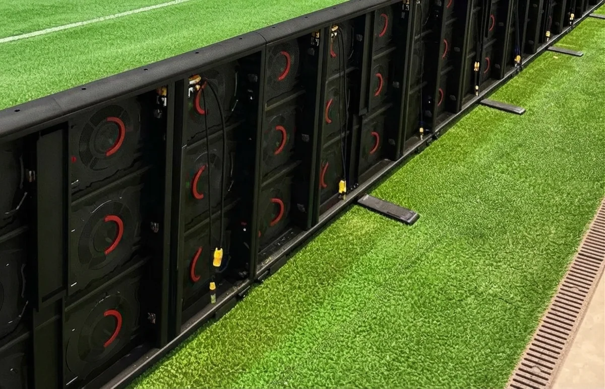 Perimeter LED boards installed along the pitch, seen from behind